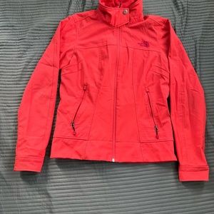The North Face women orange  jacket; size small petite.